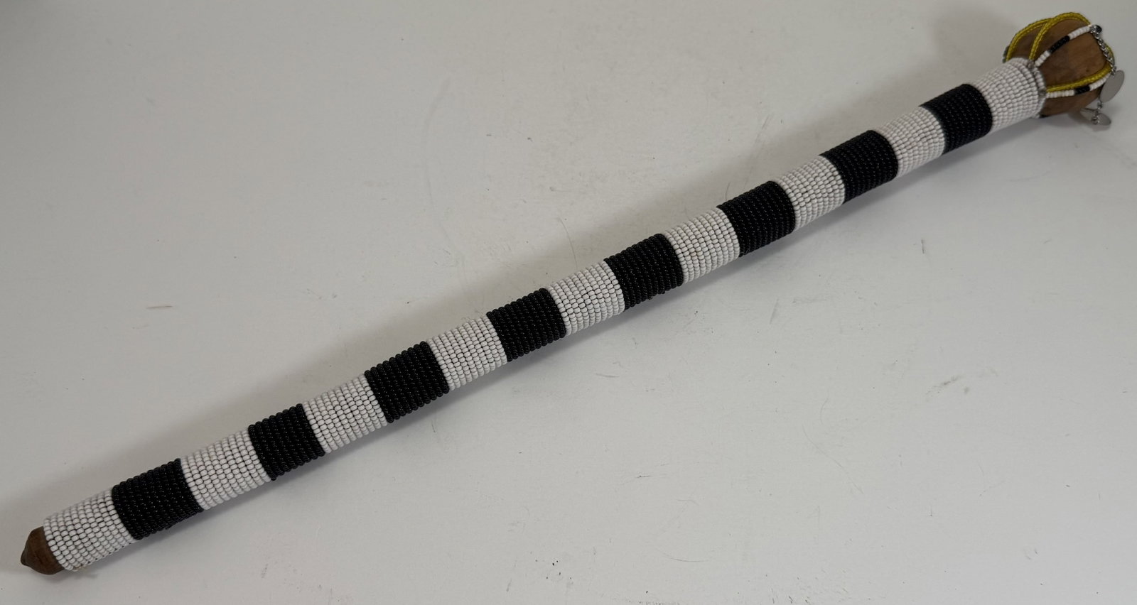 Maasai Beaded Rungu Ceremonial Club or Baton: Length: 16 1/2 inches, Diameter: approx. 1 1/2 inches at the largest part . Weight: 5 oz.