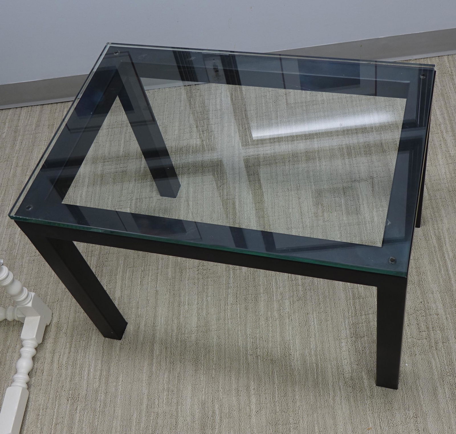 Black coffee table with glass top: Black coffee table with glass top Length: 30, Height: 22, Width: 20