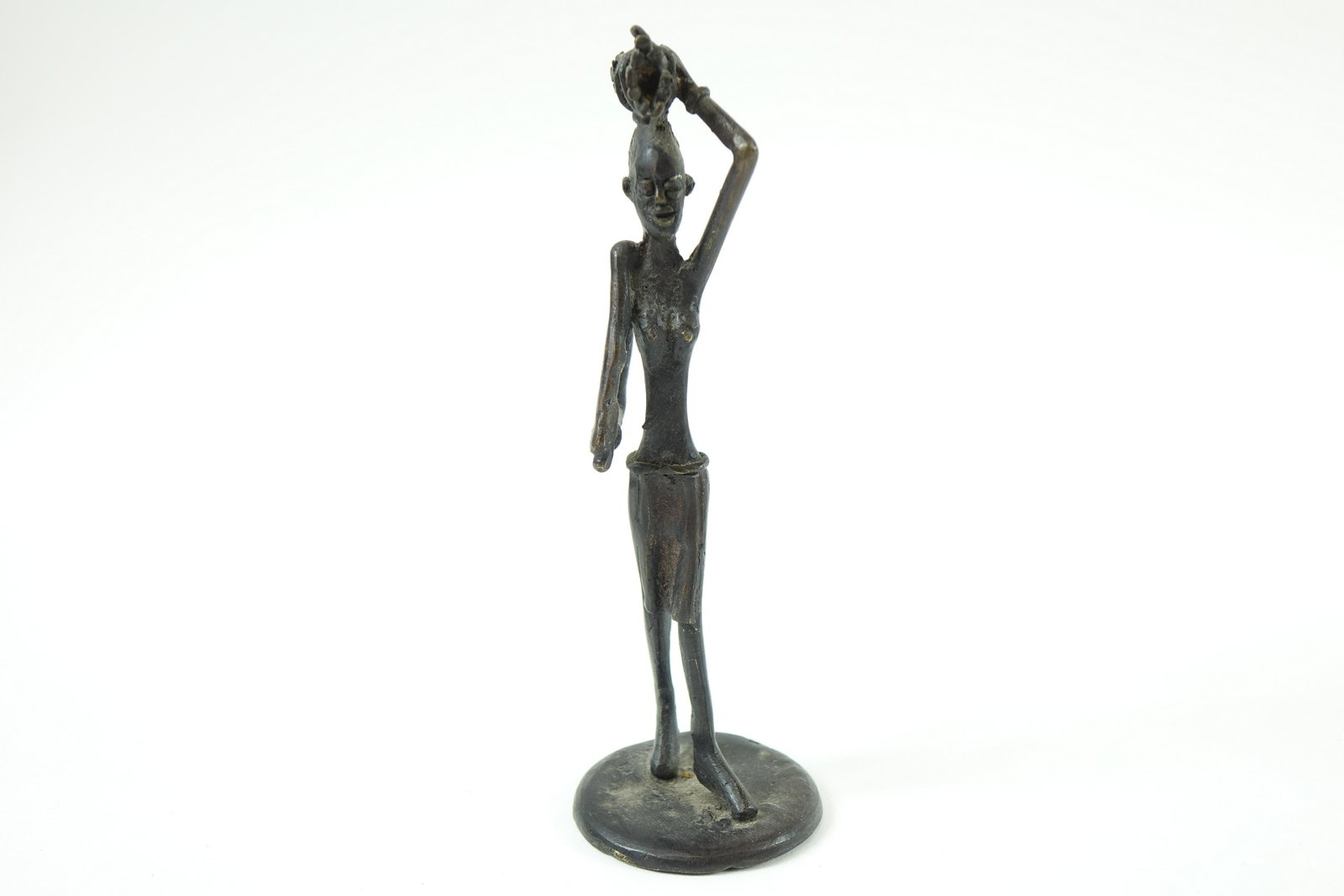 Antique Bronze African Scultpure: Antique Bronze African Scultpure - H 7" x W 2.5" x L 2.5"