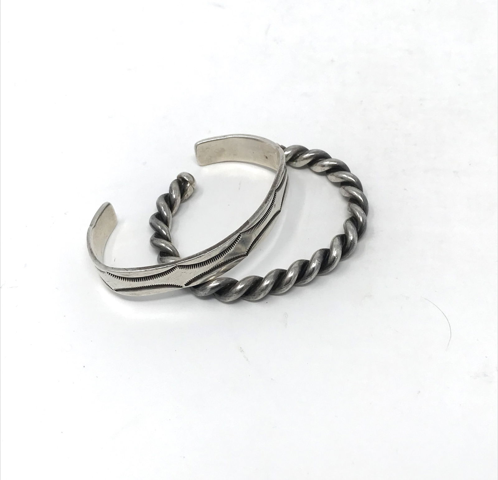 Two (2)  Navajo Sterling Cuff Bracelets, c. 1950-60. (1 of 4)