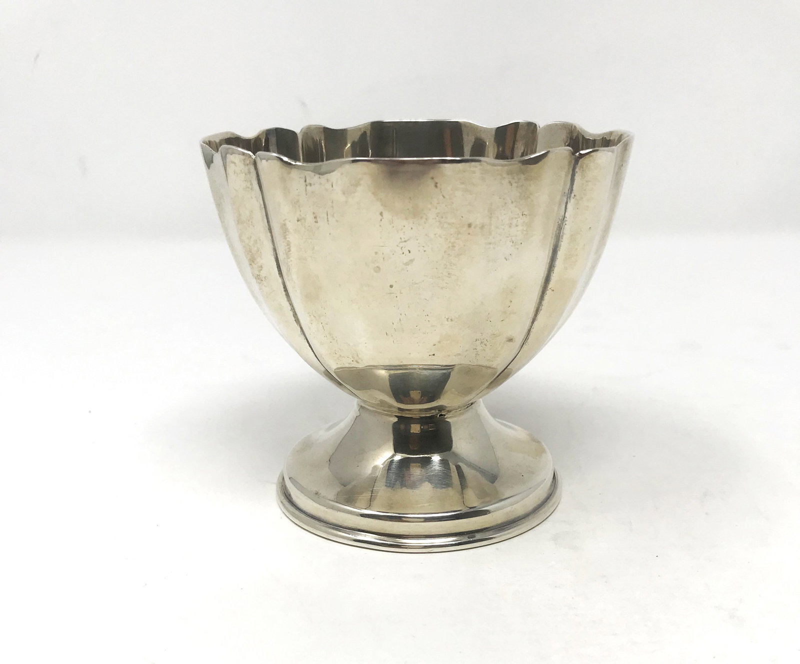 Sterling Footed Bowl, Mexico c. 1960.: A nice footed sterling bowl with a fluted and ribbed design made in Mexico City, dimensions: 3 5/8 in. height x 4 in. width, hallmarked on bottom.