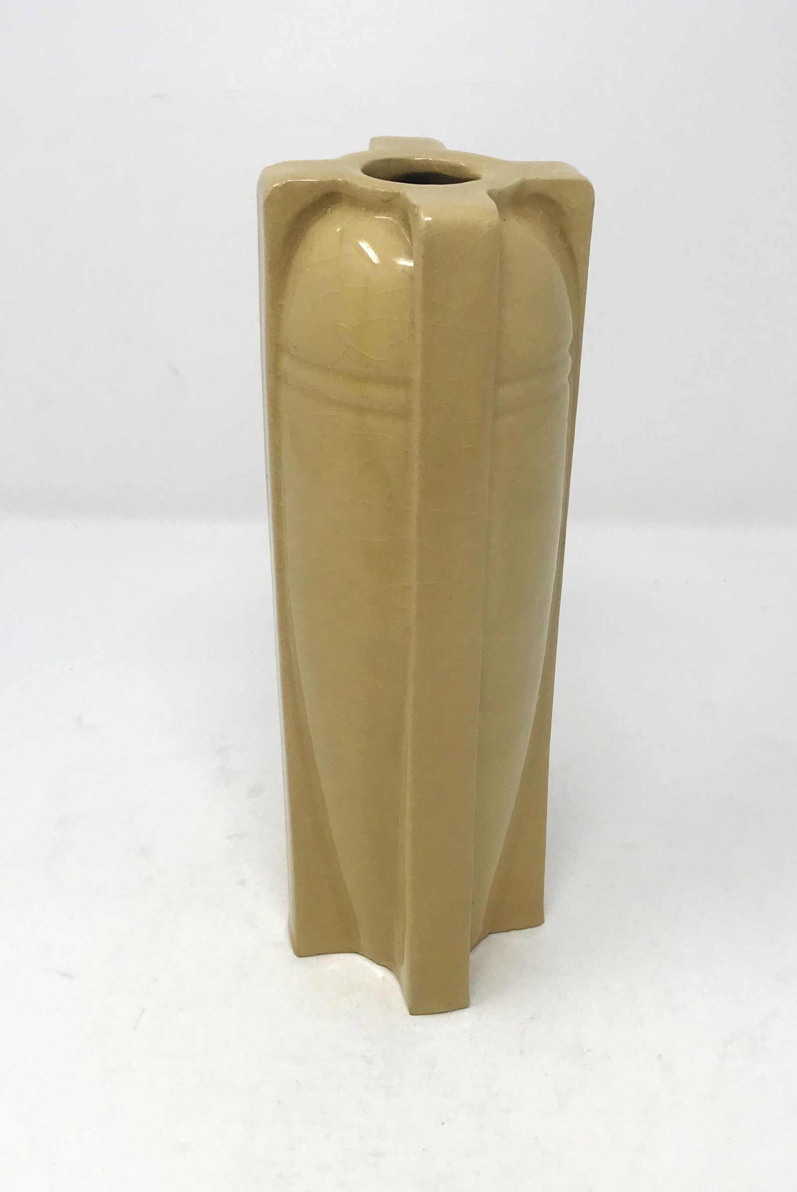 Rare Arts and Crafts Denver Terra Cotta Pottery Vase, c. 1920.: A rare Arts and Crafts pottery vase by the Denver Terra Cotta Pottery Company, circa 1920, with a beige gloss glaze and butressed design, dimensions: 8 in. tall x 2 3/4 in. wide, impressed company mar