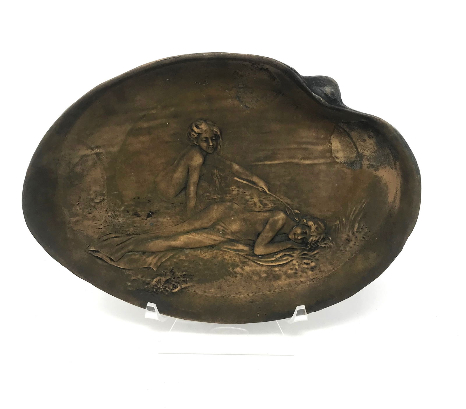 Tiffany Studios Bronze Table Tray, c. 1915.: A rare Tiffany Studios bronze table/desk tray in the shape of a clam shell with an Art Nouveau design of two women bathing along a shoreline, dimensions: 10 1/2 in. long x 8 1/2 in. wide x 1 3/4 in. h