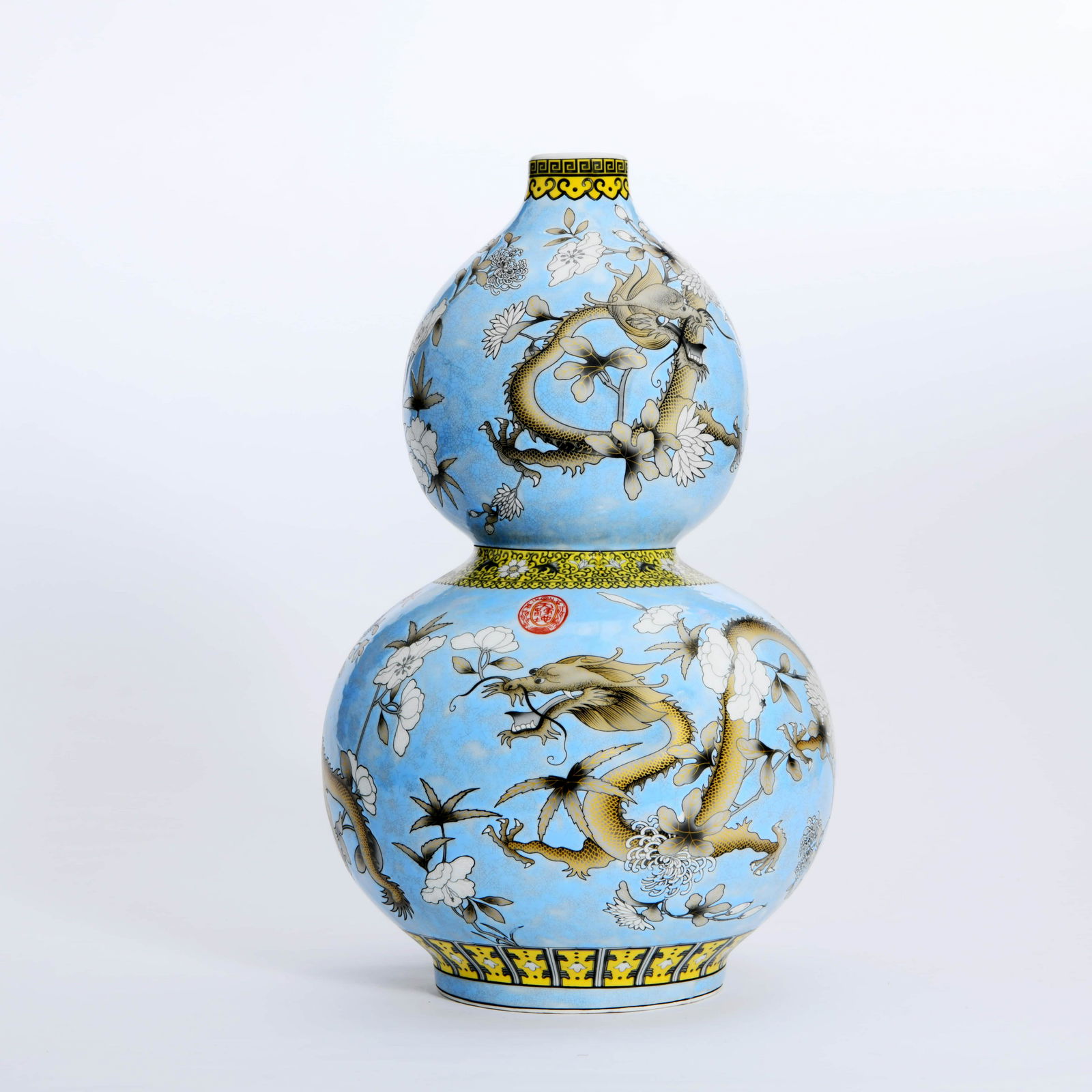A Blue Ground Famille Rose Dragon Pattern Porcelain: A Blue Ground Famille Rose Dragon Pattern Porcelain Gourd-shaped Vase1500