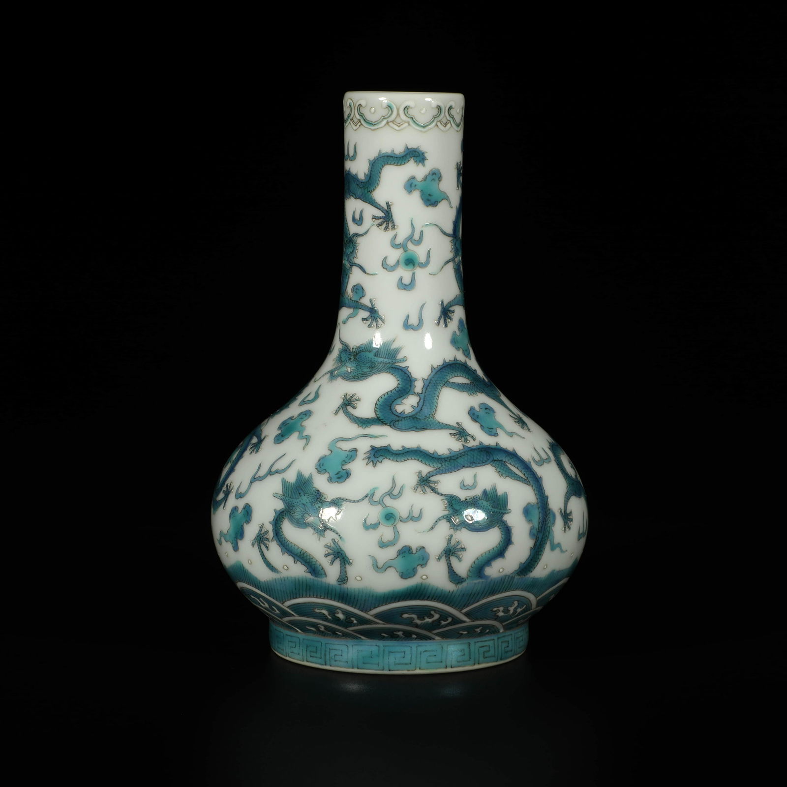 A Blue Colored Nine Dragons Porcelain Vase: A Blue Colored Nine Dragons Porcelain VaseHeight:14cm, Diam.6.5cm,