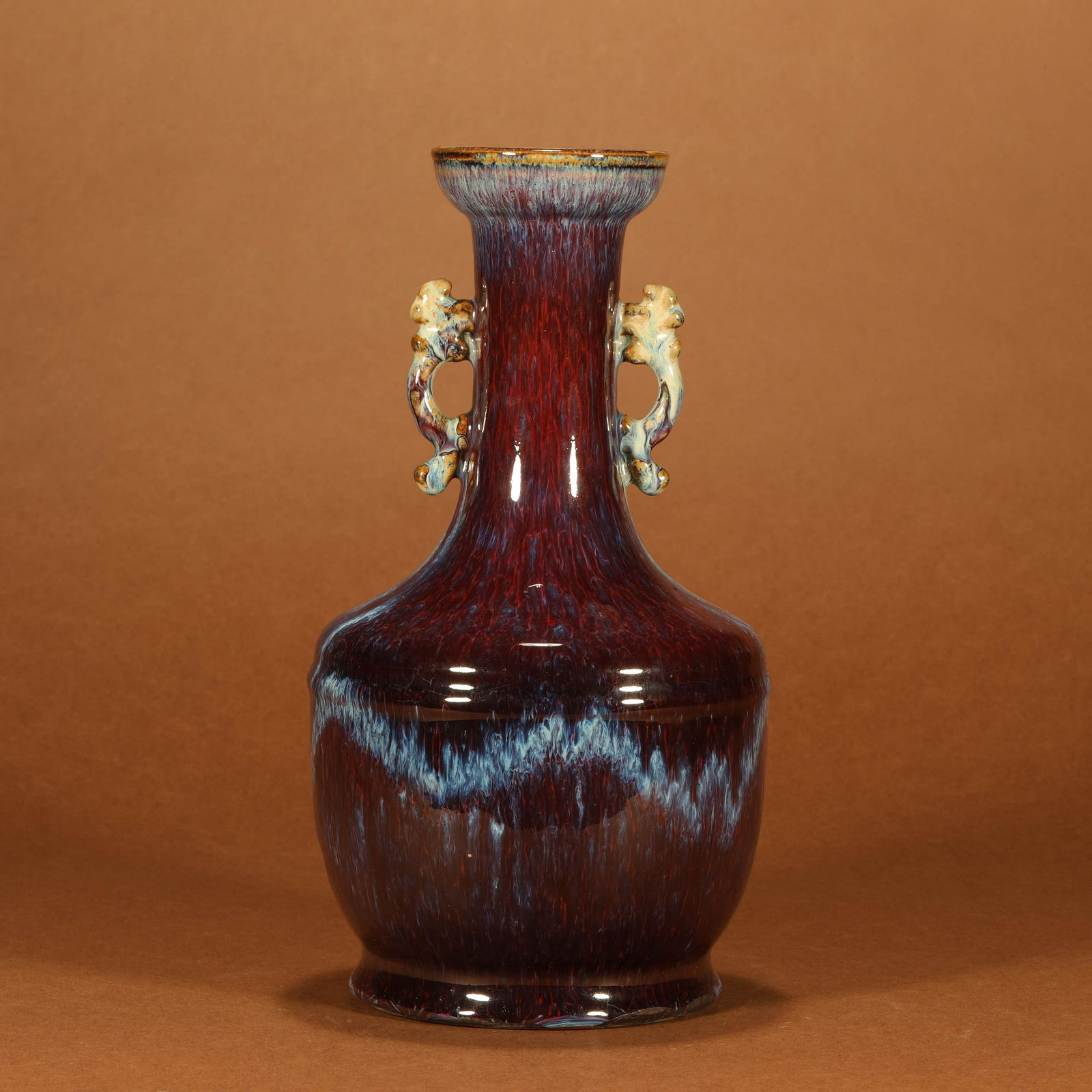 A Kiln Changed Porcelain Zun with Double Dragon Shaped: A Kiln Changed Porcelain Zun with Double Dragon Shaped EarsHeight:28cm, Diam.12cm,