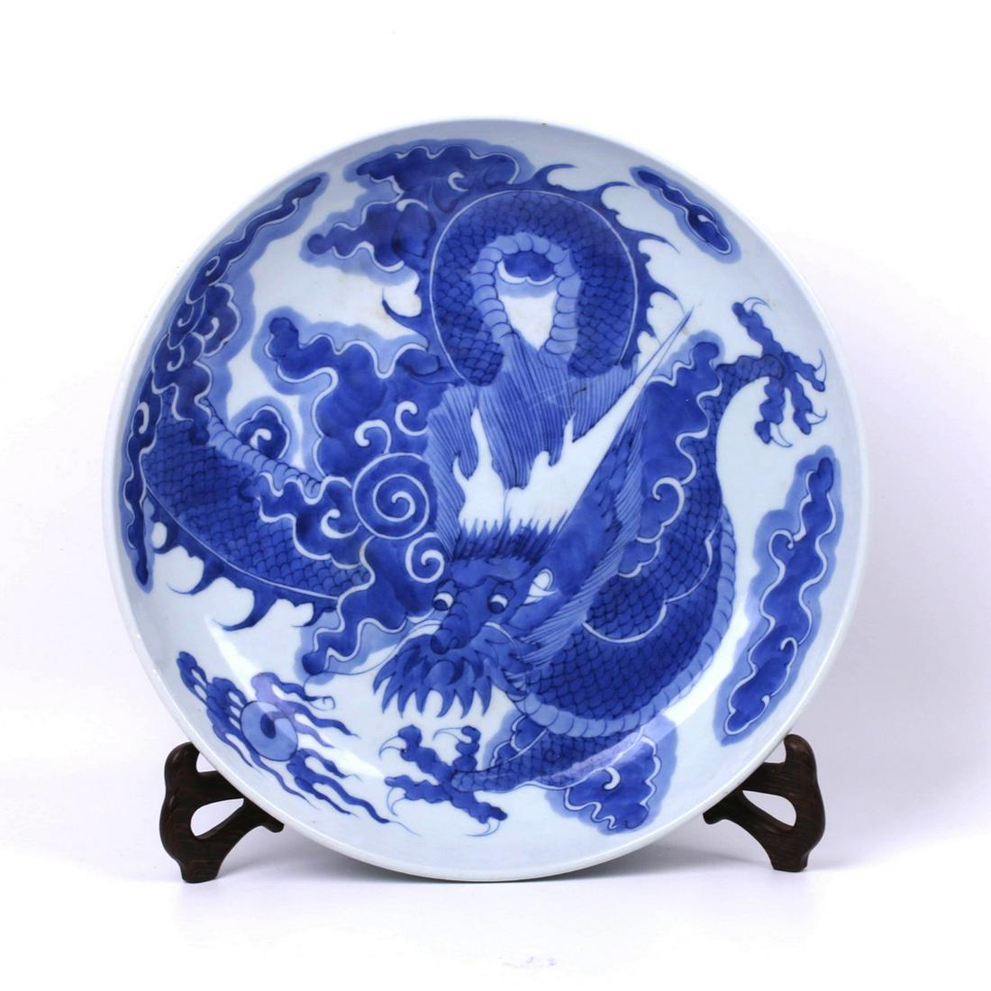 A Blue and White Dragon Pattern Porcelain Plate: A Blue and White Dragon Pattern Porcelain Plate Diam.7.5cm, Height:6cm, From the private collection of Mr. Asakawa's grandfather, a Japanese who has always great passion and excitement on collecting a