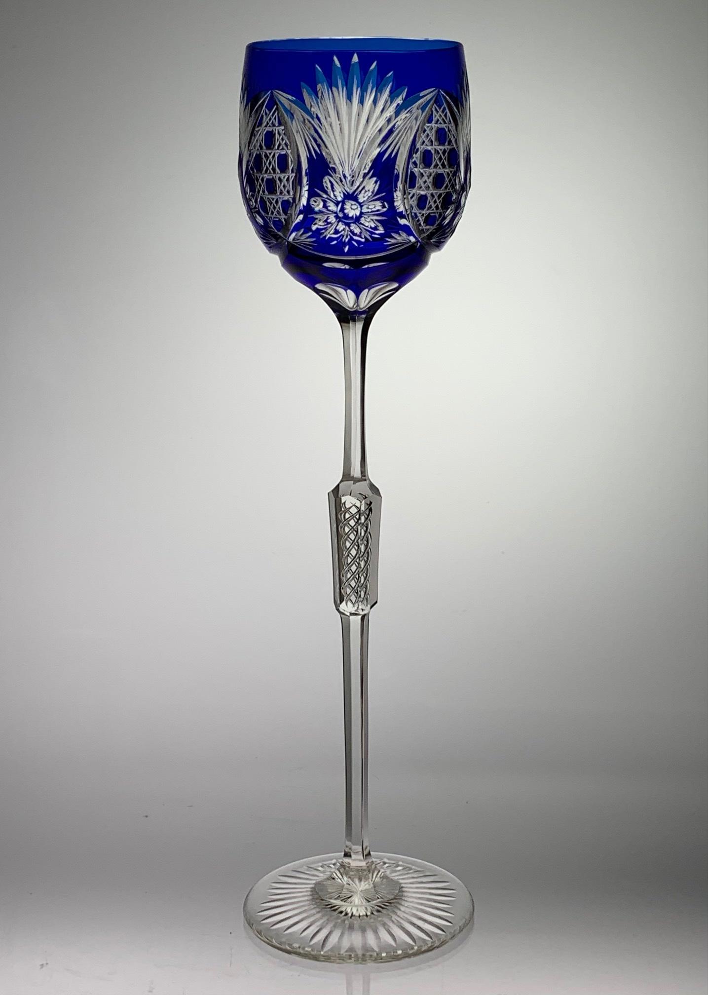 St. Louis Cut Glass Cobalt To Clear Tall Hock Wine: Unique tall hock wine cut by St. Louis. Cobalt to clear cut glass with air twist in mid-stem. Circa 1st. Qtr. Of 20th cent. Dimensions: 11" tall.