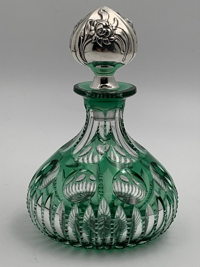 Pairpoint Cambridge Cut Glass Perfume With Sterling: American Brilliant cut glass green cut to clear perfume with sterling top. Glass cut by Pairpoint in their Cambridge pattern. Sterling top by Gorham Mfg. Circa 1900. Approx. dimensions: 5 1/2" high x 