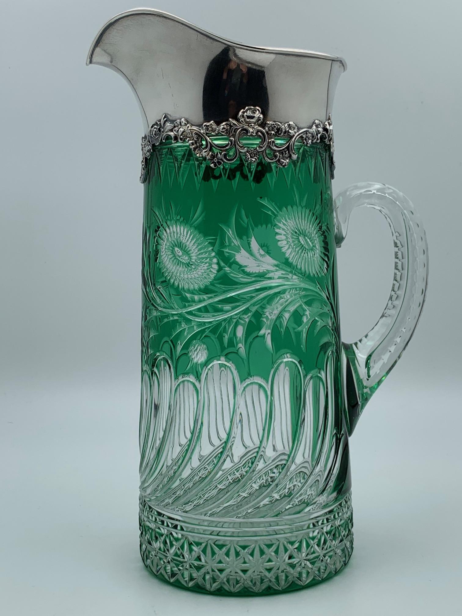 Stevens & Williams Green-Clear Cut Glass Gorham: English cut glass emerald-clear pitcher by Stevens & Williams. Sterling mount by Gorham Mfg. with date mark ca. 1898. Dimensions: 10 1/2" tall x 4 1/4" dia.