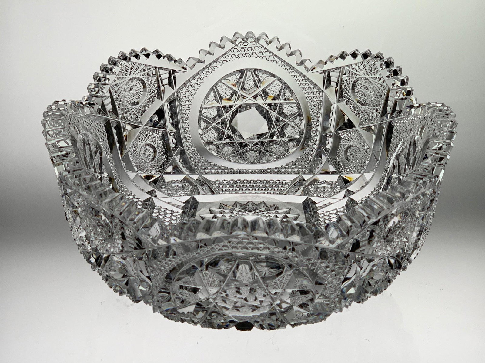 Very Rare Clark Waldorf Cut Glass 9.5" Bowl: This bowl is American Brilliant cut glass. Cut in the very rare Waldorf pattern by T. B. Clark & Company. It has a heavy blank with great clarity as seen through the faceted buttons on the hobstars. E