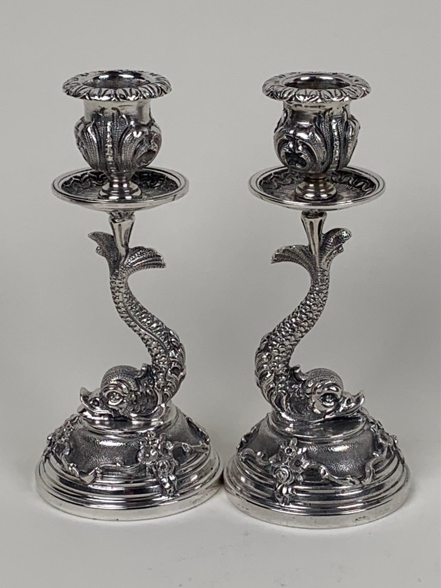 Pair Italian 800 Silver Candlesticks Dolphins Ca. 1940: Great pair of silver candlesticks with dolphin stems. Have Italian hallmarks for Circa 1940 and 800 silver. Dimensions: 6"h. x 2 3/4" dia. Approx. tot. wt. 690 gms. (22 troy oz.)