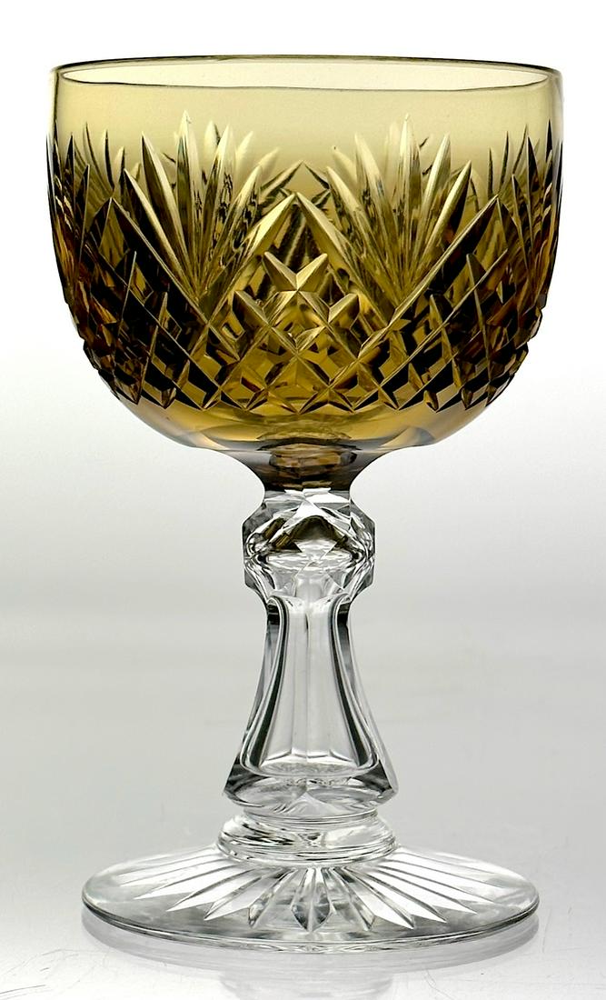 Dorflinger Strawberry, Dia. & Fan Cut Glass Wine Amber-Clr: American Briliant cut glass wine stem. Cut by Dorflinger in Strawberry, Diamond & Fan. This wine as a deep amber color cut to clear. The pyramid shape stem is fluted with a faceted knob. The base is c