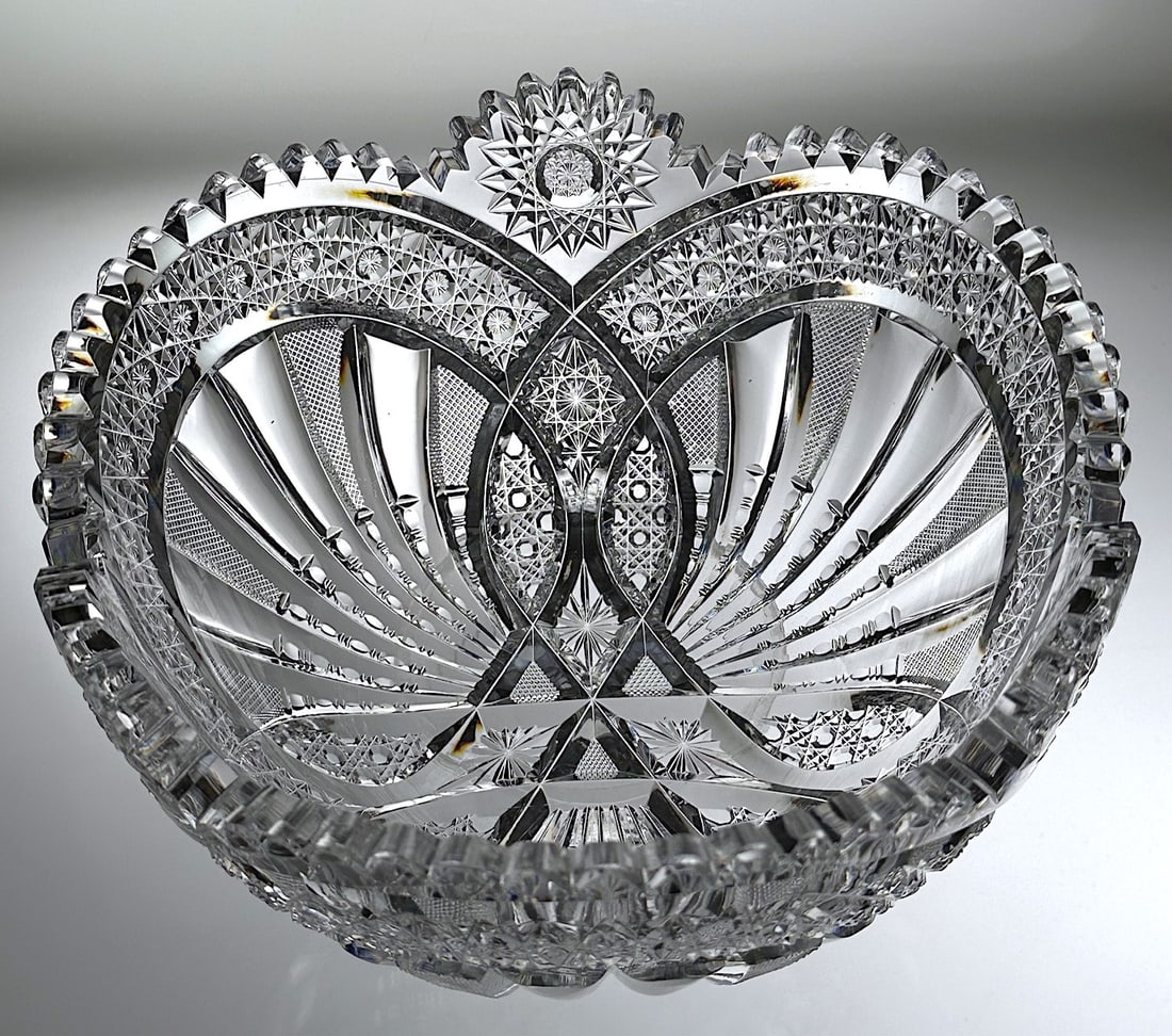 American Brilliant Cut Glass Bowl Circular Design & Tusks: Cut glass bowl from the American Brilliant period. The circular design on this piece is artistically cut. There are round bands of Russian cut and the circles are cut with tusks and crosshatching. The