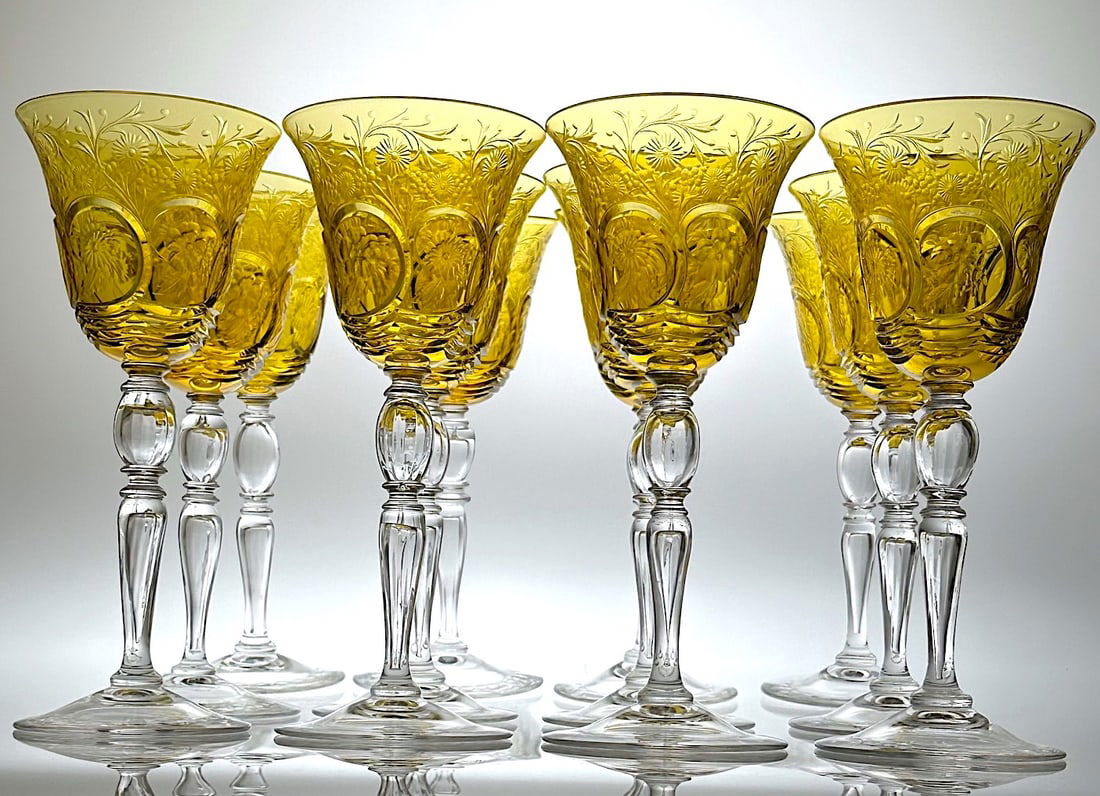 Signed Steuben Cut & Engraved Glass Amber Goblets Set/12: This is an amazing set of 12 goblets signed by Steuben Glass Works. They have a wonderful amber color with tall and graceful clear stems. They are in Steuben's Shape 8351 and were probably engraved by