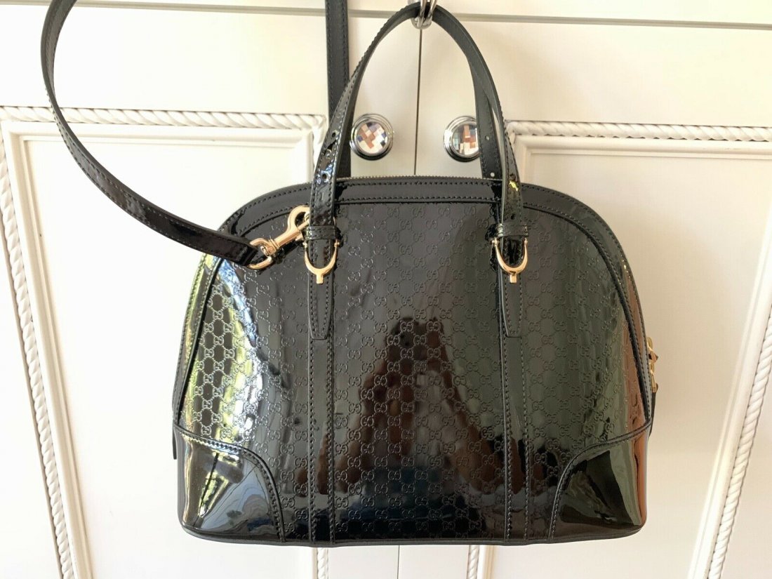 Gucci Nice Microguccisima Patent Leather Top Handle Bag: Gucci Nice Microguccisima Patent Leather Top Handle BagFeatures:Inner Pockets, Bottom Studs, Adjustable Strap, Certificate of Authenticity, Convertible, Cross-Body Strap, Detachable Strap, Lined, Mobi