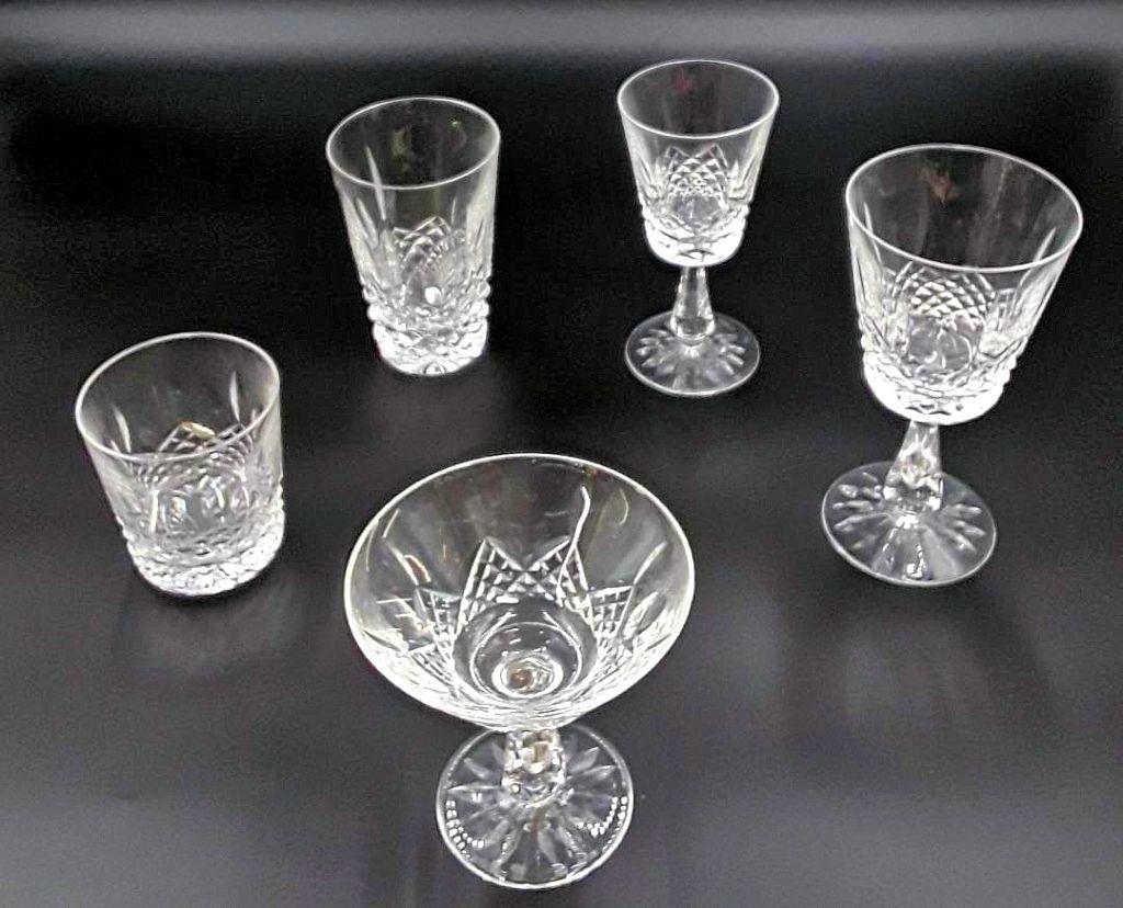 VINTAGE WATERFORD STEMWARE - 29 PIECES: Irish, last quarter 20th century Kenmare pattern, cut crystal 29 pieces comprising, 6 champagne glasses, 6 goblets, 6 wine glasses, 5 tumblers, and 6 highball glasses.