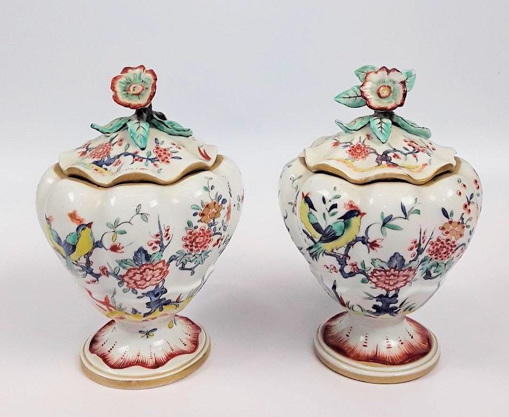 PAIR OF 19TH CENTURY CHANTILLY STYLE JARS: French, late 1900s poss. copies of 18th century Chantilly, possibly by Samson Footed and lidded jars with lovely handpainted birds on branches and a floral finial in the Kakiemon style. There is a chi