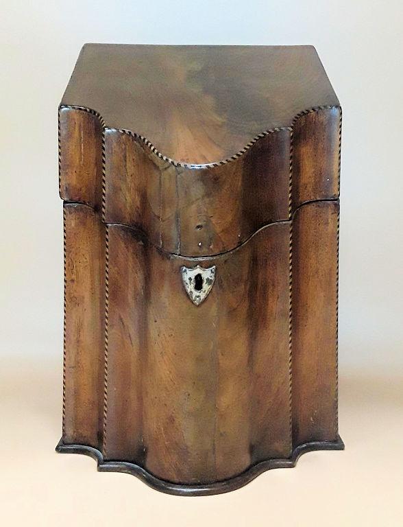 GEORGIAN PERIOD KNIFE BOX: English, circa 1811 - 1820 Inlaid stringing and fitted interior with original configuration for knives 14" h 9" w 9.5" d. Provenance: Property of the late Senator Cairine Wilson, 1885 - 1962. First wo