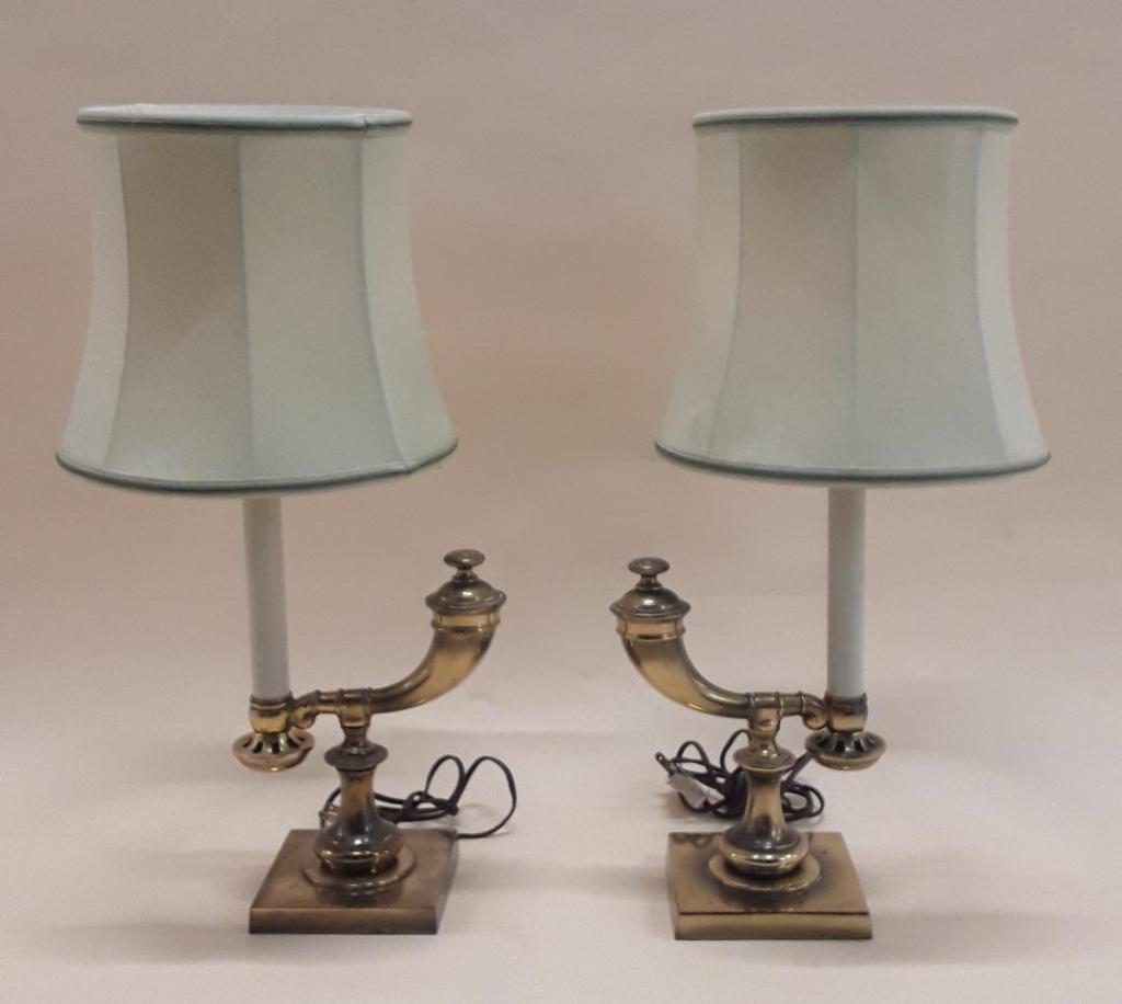 PAIR OF "POWDER HORN" BRASS LAMPS: Mid 20th Century Elegant , well-made and heavy brass lamps 14" h x 8" w x 5" d. Provenance: Property of the late Senator Cairine Wilson, 1885 - 1962. First woman appointed to the Canadian Senate, a di