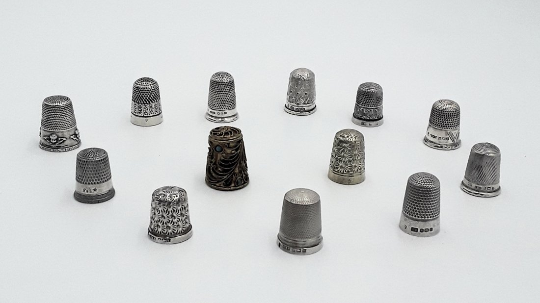 COLLECTION OF SILVER THIMBLES: Nice lot of 13 silver thimbles having various makers and dates 54 grams