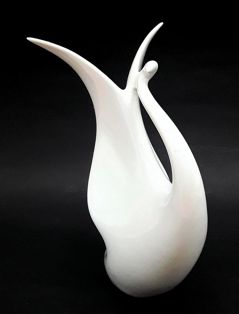 MID-CENTURY MODERN ROYAL DUX SWAN FIGURE: Czech, circa 1950s Designer: Jaroslav Jezek Elegant stylized porcelain swan 7" h x 5" wx 6.5"d
