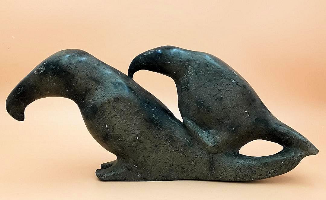 LARGE INUIT CARVING OF TWO BIRDS: Cape Dorset Circa 1960s/1970s Carved soapstone figures of two courting birds. 8" h X 18" w X 4"d