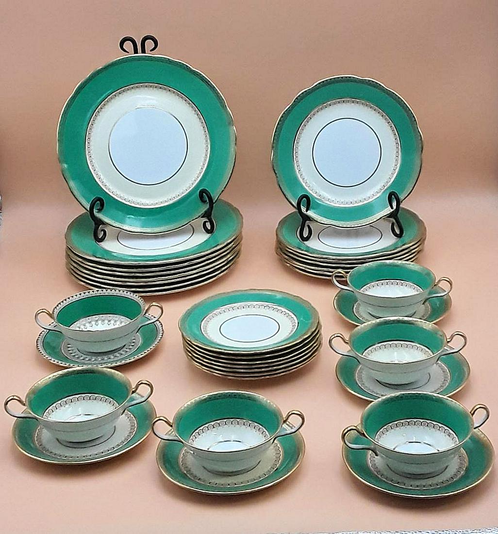 AYNSLEY PART DINNER SERVICE: English, mid 20th century Pattern 641 35 pieces comprised of: 8 x 10" dinner plates; 7x 8.75" salad/luncheon plates; 8 x 6.75" bread plates; 6 cream soup bowls with 6 saucers. No chips or cracks.