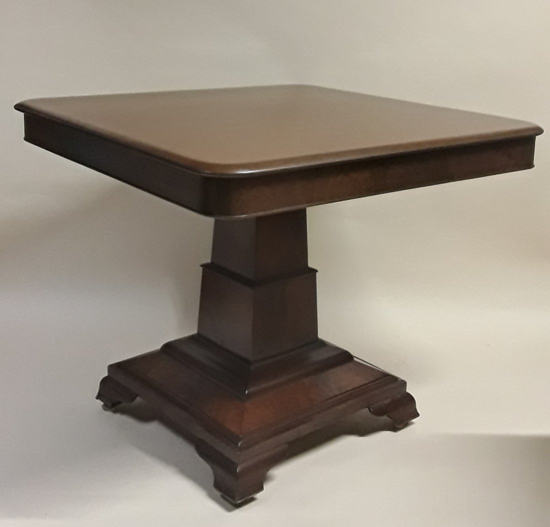 FINE VICTORIAN CENTRE TABLE: Canadian, Empire Revival, circa 1880Single stepped pyramid form pedestal walnut table having a square top and a stepped square base. Good condition overall, with loss on foot noted.29.5\" h x 36\" squ