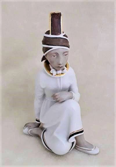 VINTAGE ROYAL COPENHAGEN ICELANDIC GIRL FIGURINE: Denmark, Arno Malinowski, designer. Overglaze porcelain, no. 12463. Juliane Marie Mark. Date stamp for 1948. Minor restoration to tip of headpiece