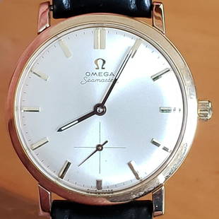 OMEGA GOLD SEAMASTER MEN'S WATCH: Switzerland, circa 1959-1961 Solid 9K gold Omega Seamaster watch. In excellent condition and recently serviced.38.1 mm across crown and the same across the lugs.