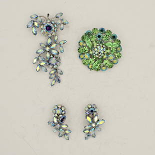 SPLENDID SHERMAN BROOCH AND EARRINGS: Canada, circa 1950s High quality crystal round Sherman brooch along with a pair of Sherman earrings and a similar "drop-pendant" brooch, not Sherman.