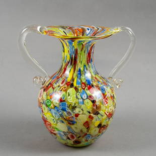 MURANO MILLE FIORI ART GLASS VASE: Italy, Venice late 20th century Large two-handled art glass vase/urn in a mille fiori design with sparkling gold elements. 10" x 9.5" x 6.5"