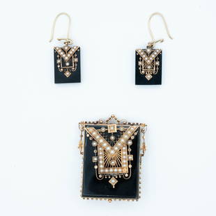 VICTORIAN 14k GOLD AND ONYX  SET: Fine 19th century 14K yellow gold, seed pearl and black onyx brooch/pendant and earring set. Brooch, 1.75" x 1.5" and 28.6 grams total weight. Appraised value (1990) $2000.00