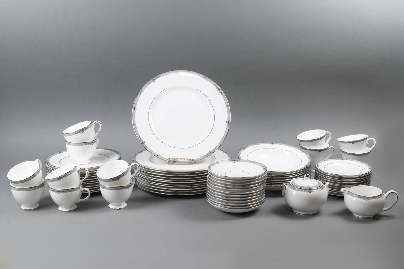 WEDGWOOD AMHERST DINNER SERVICE: England, last quarter 20th century. Wedgwood fine porcelain dinner service mostly complete for 12 in the elegant Amherst pattern. 12 dinner plates; 12 luncheon/salad plates; 12 side/bread plates; 12 s