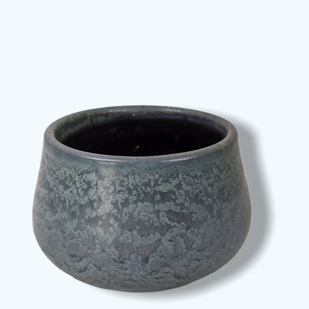 157 Hampshire Pottery: Hampshire Molted Glaze Bowl. Marked Hampshire and inscribed 49 on the bottom. 5" W x 3" H