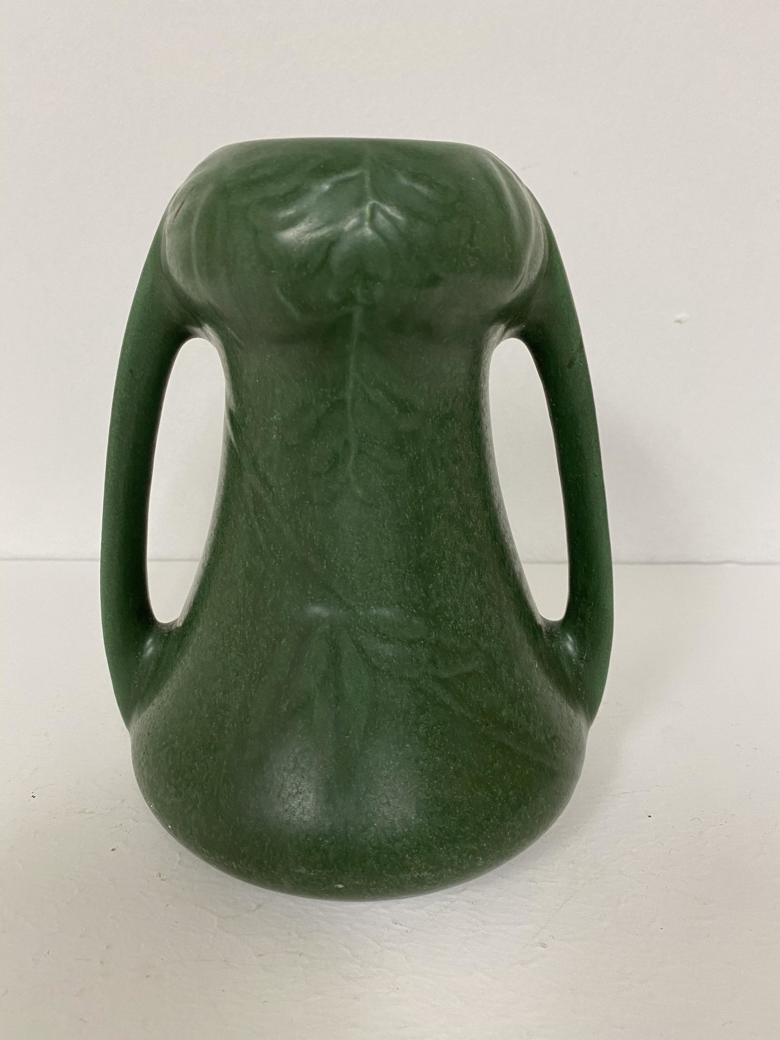 Weller Pottery: fru russett form matte green 7" tall