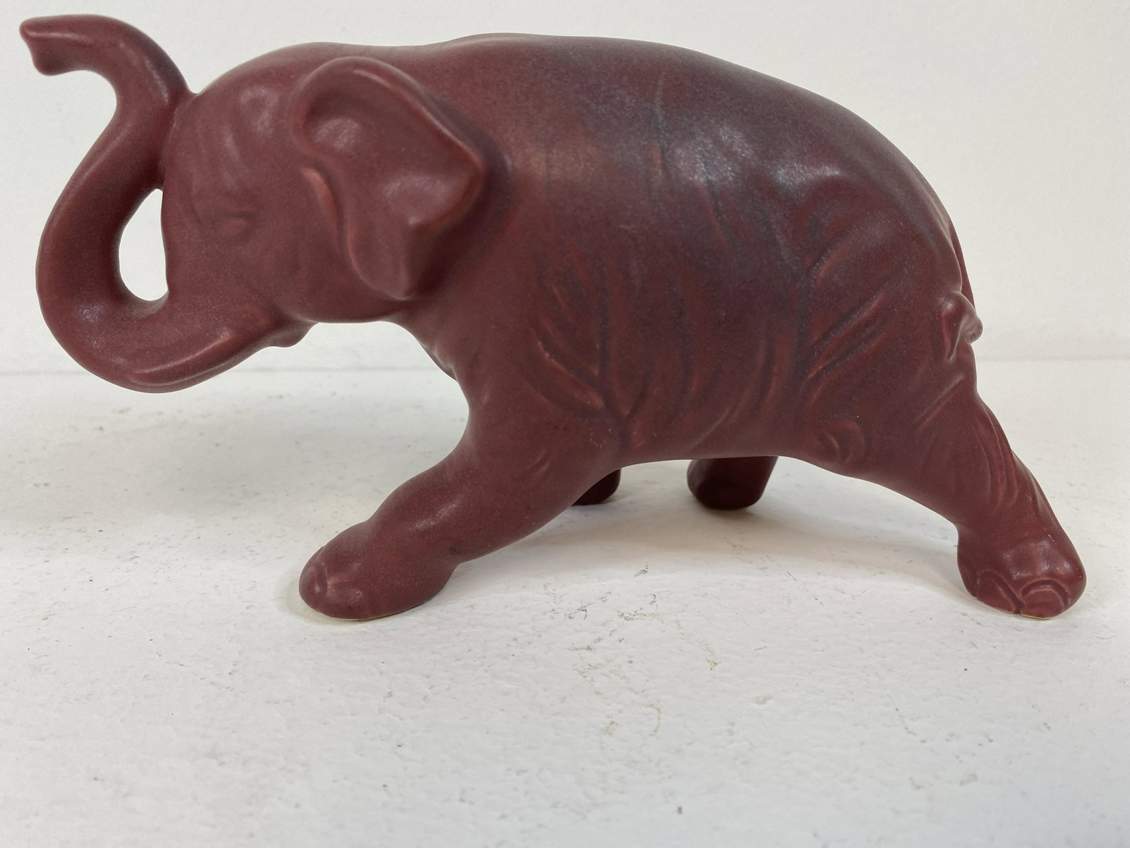 Van Briggle Pottery: Elephant. 8" long x 4 1/4" tall.