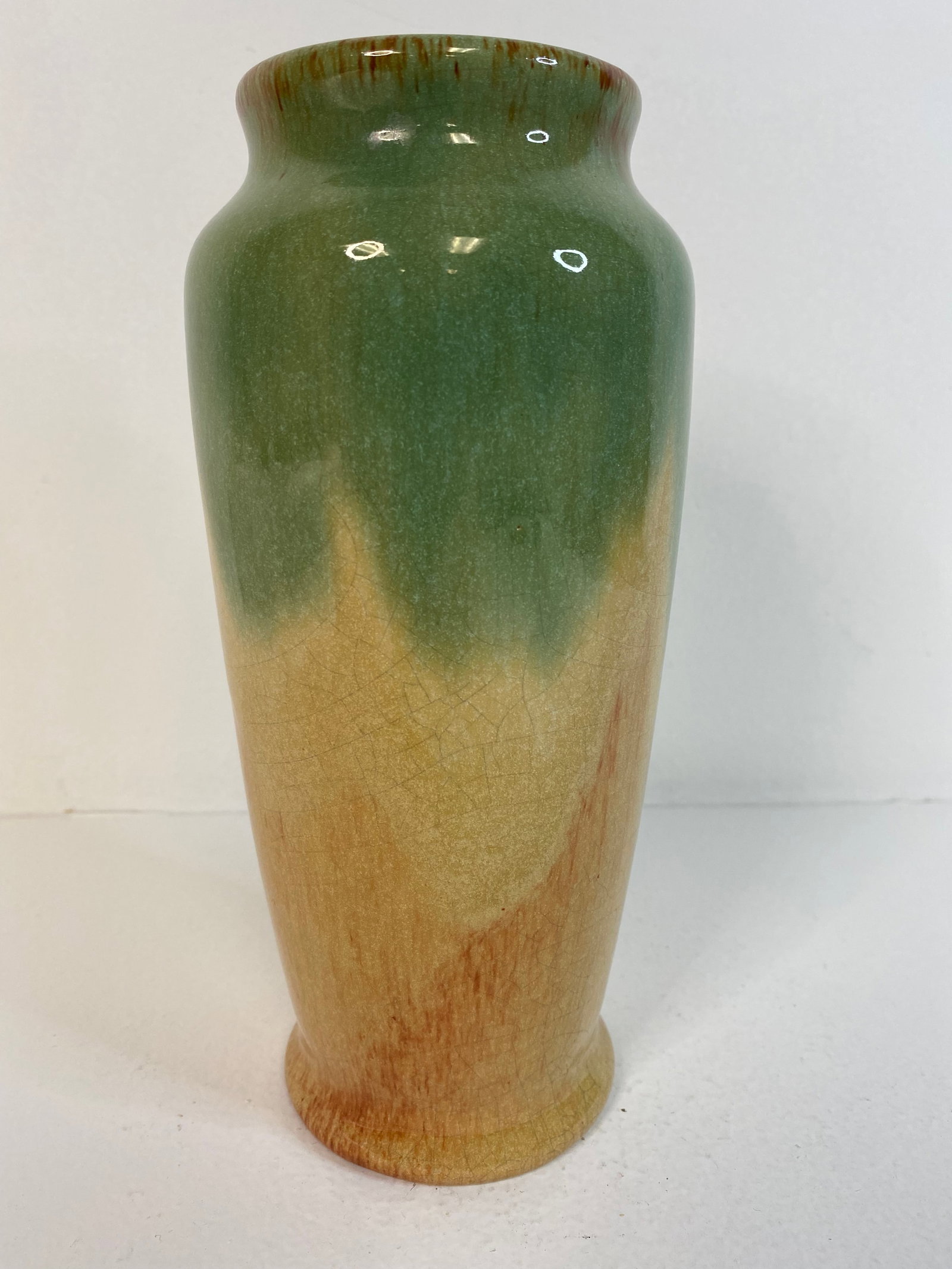 Muncie: Nice Tall high Glaze at 8 1/8" tall.