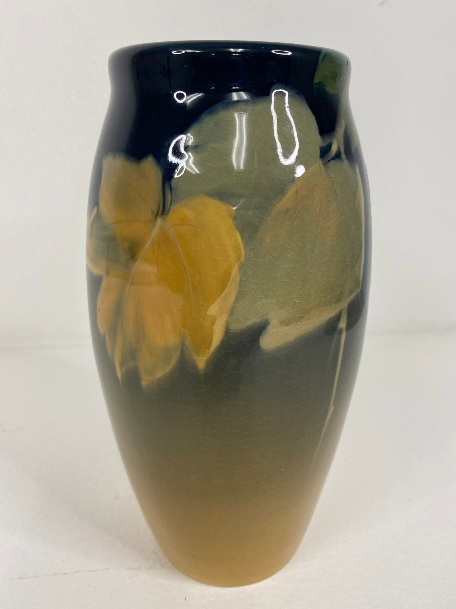 Rookwood Pottery: Iris Glaze? Standard Glaze? Very nice vase done in 1902 by Rose Fechemeier Featuring leaves. 7 1/2" tall