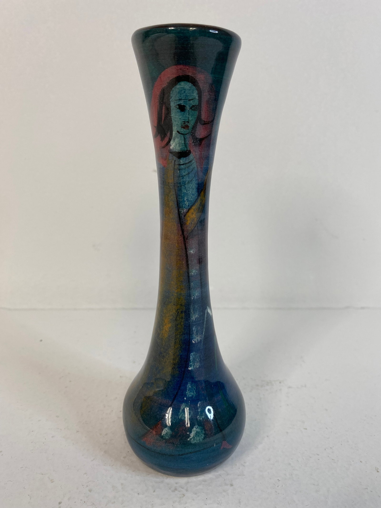 Pillin Pottery: Slender bud vase featiuring a woman and horse. 7 1/8" tall