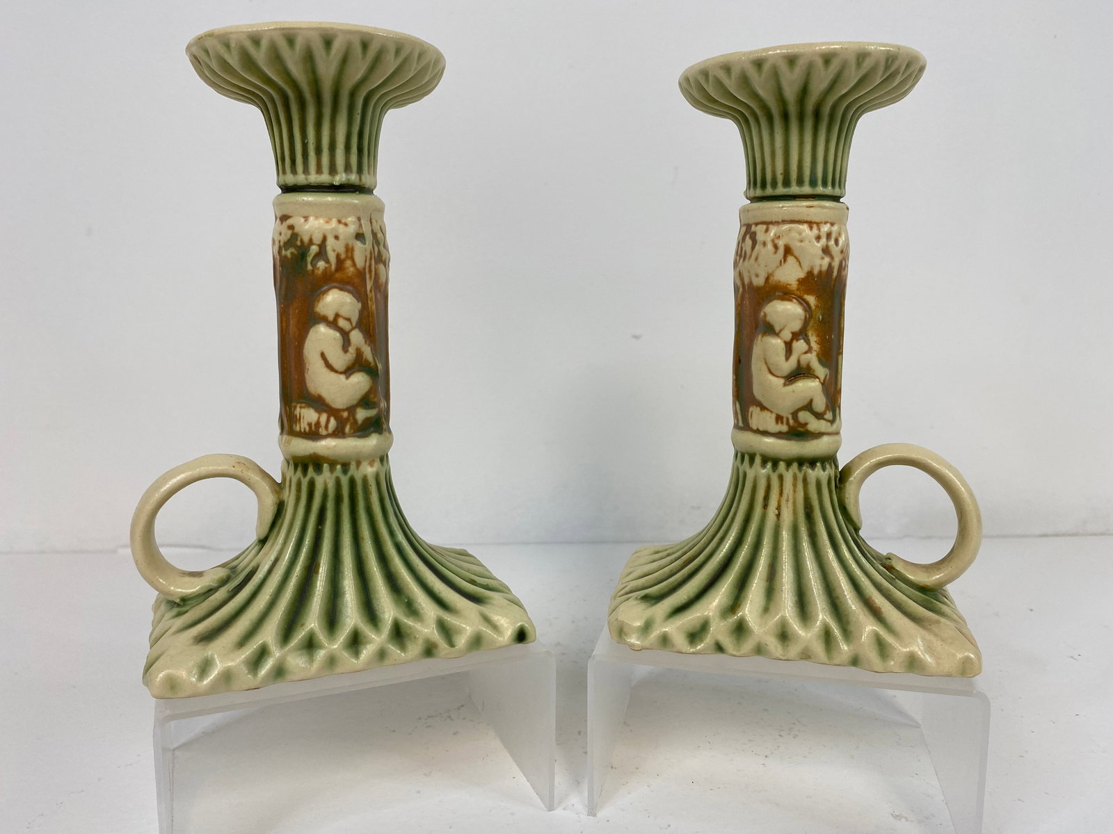 Roseville Pottery Donatello: Pair of finger hole candle holders at 6 3/8"