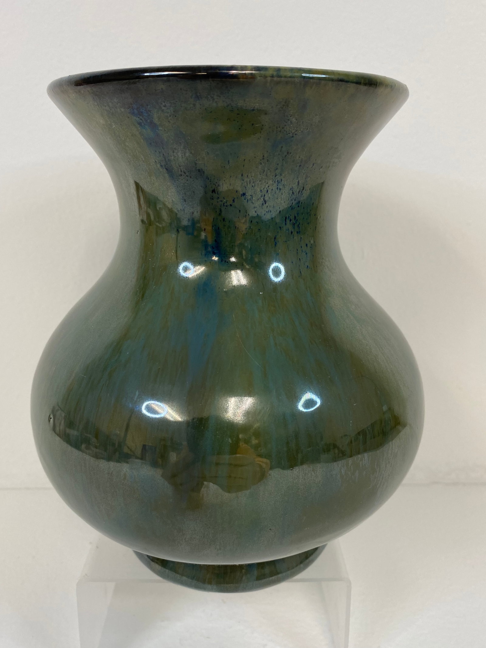 Fulper Pottery: There is a lot going on with this one Greens, Blues and browns makeup this cool piece at 7" tall