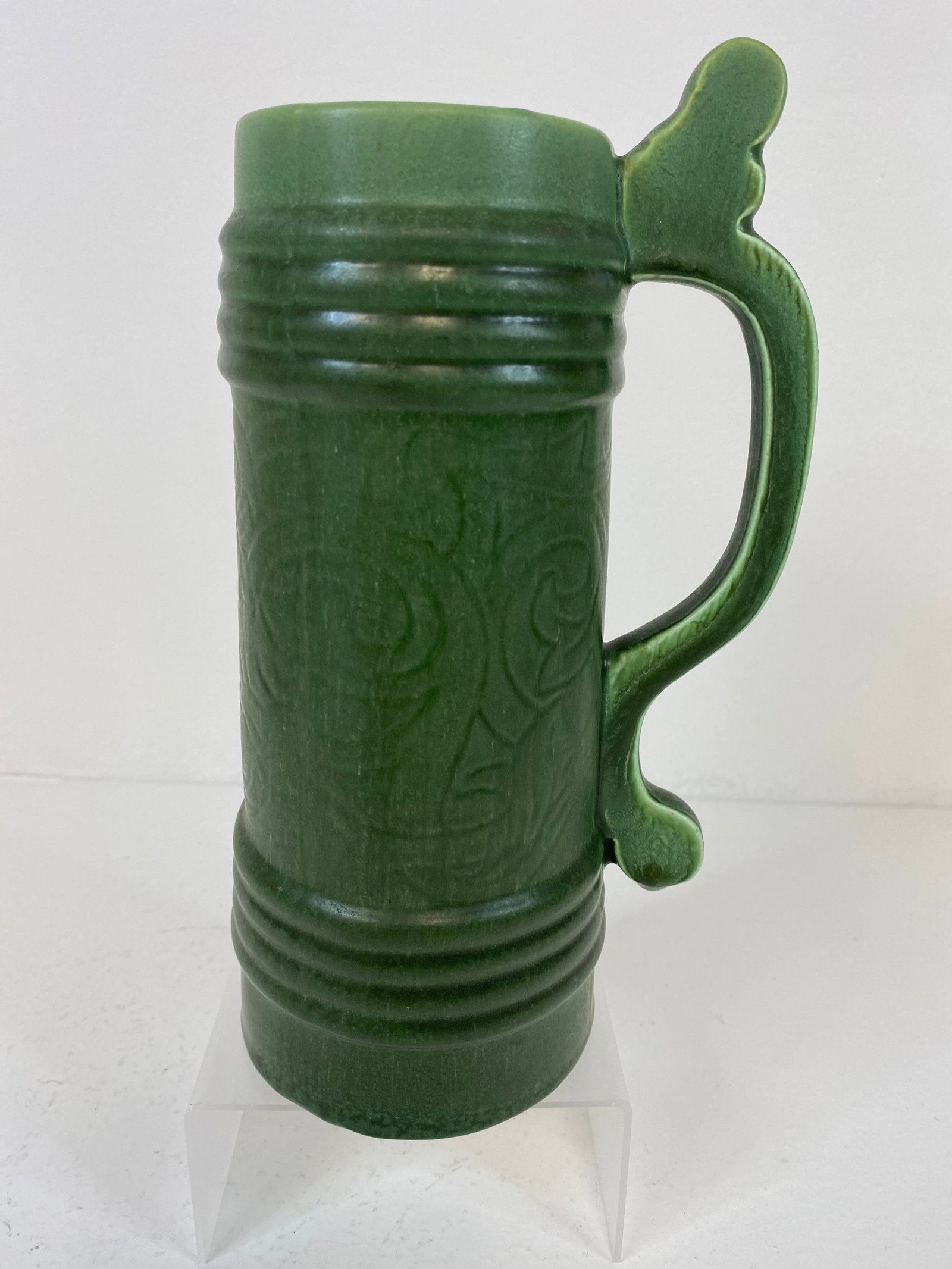 Hampshire Pottery Tankard: tall tankard at 8 1/4" tall with a design through the center.