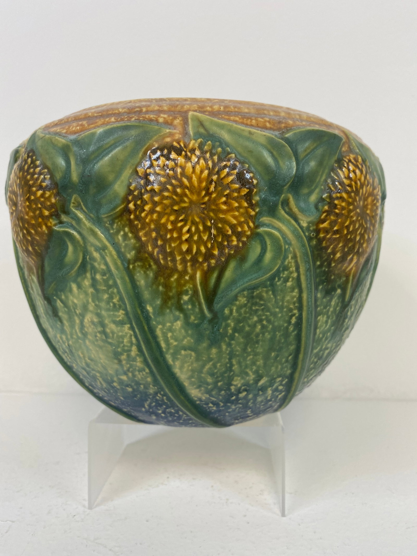 Roseville Pottery Sunflower: The sunflower pedals are really popping out on this 6" tall x 8 1/4" wide jard. Very crisp
