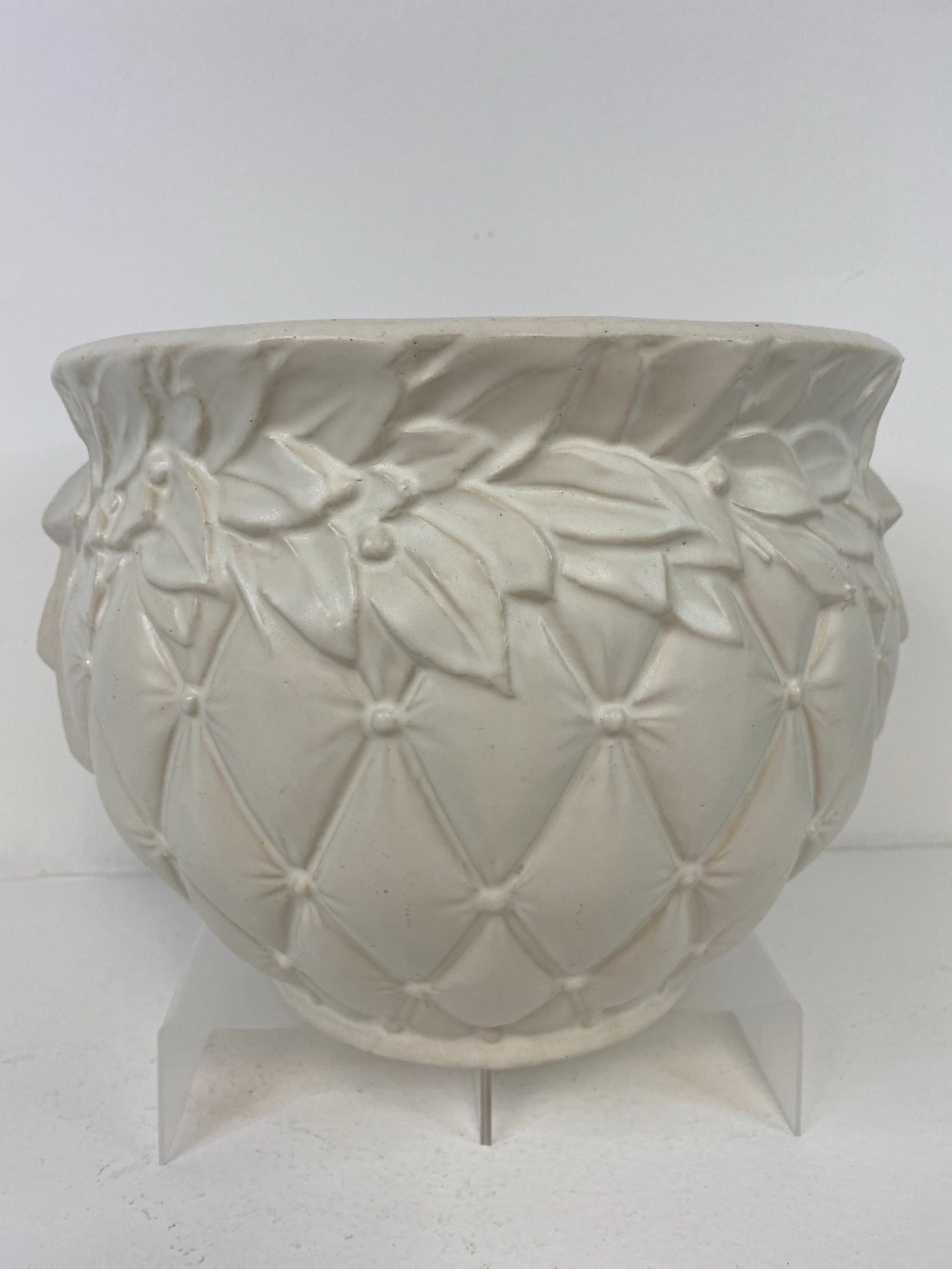 McCoy Pottery: Quilted Jardinere in white measuring 8 1/4" tall and arlund 11 1/2" across