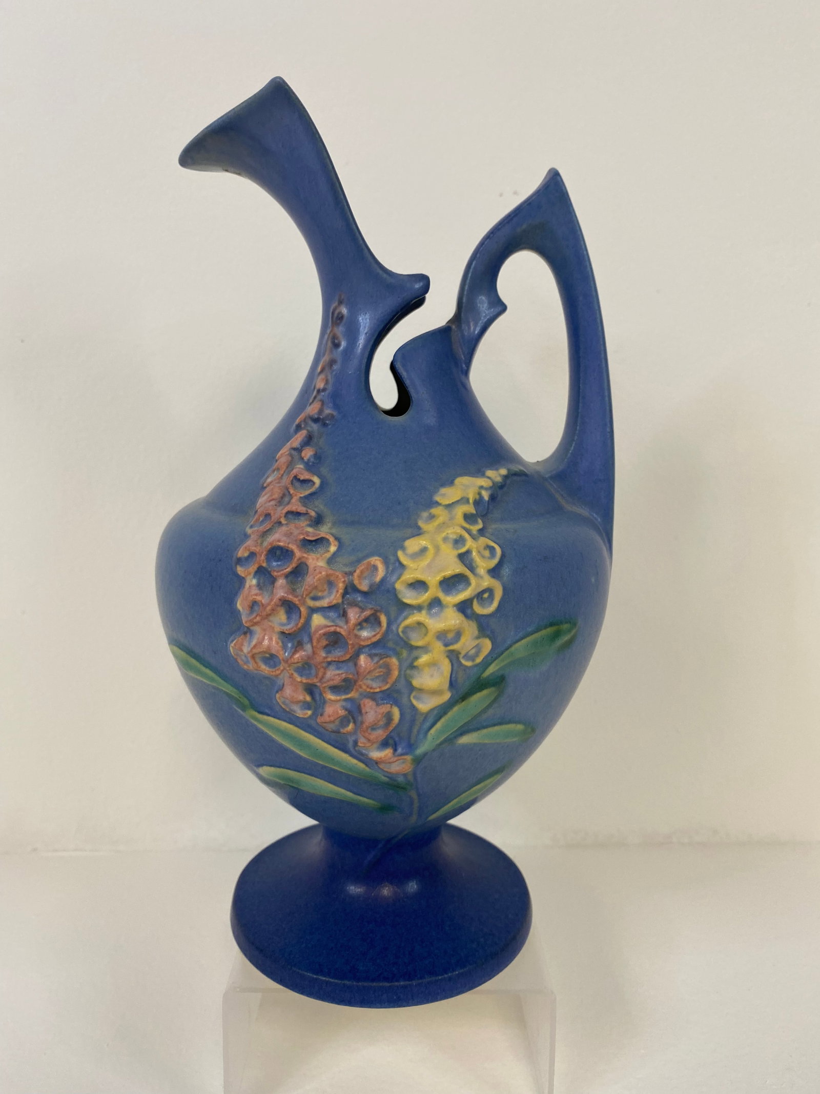 Roseville Pottery Foxglove: Taller ewer mold 5-10" and has a souvenir sticker from the Wisconsin Dells. Stands 10 1/2" tall