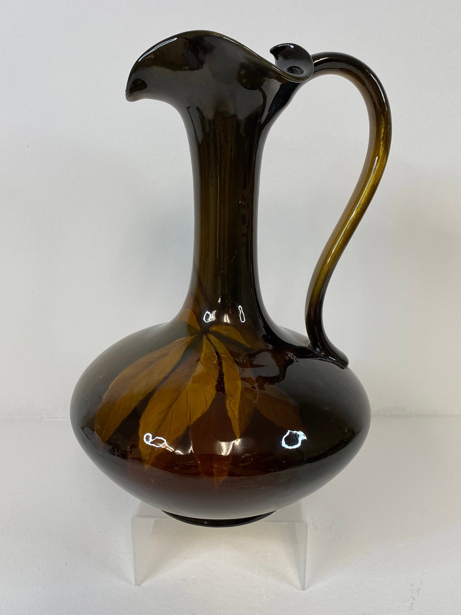 Rookwood Pottery: Large ewer artist signed in 1898 and has been x'd as a factory second measuring at 10 1/2" tall