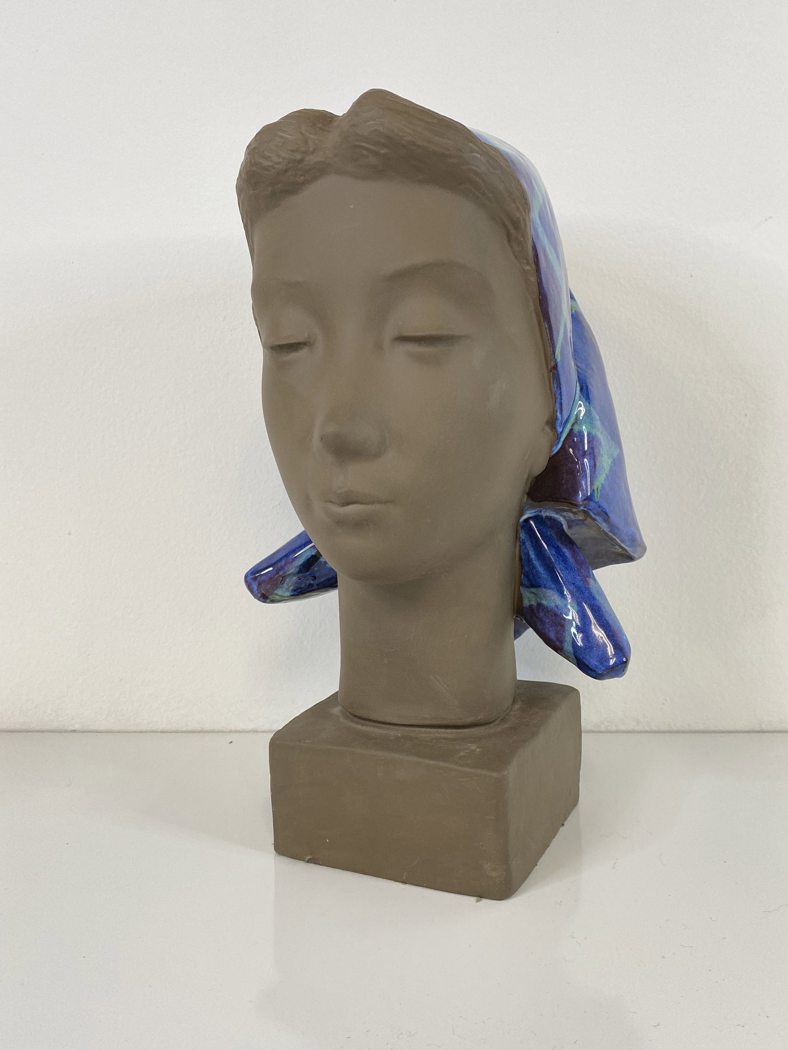 Royal Copenhagen Pottery: Johannes Kedegard is responsible for this figural head of a woman with scarf that measures13" tall