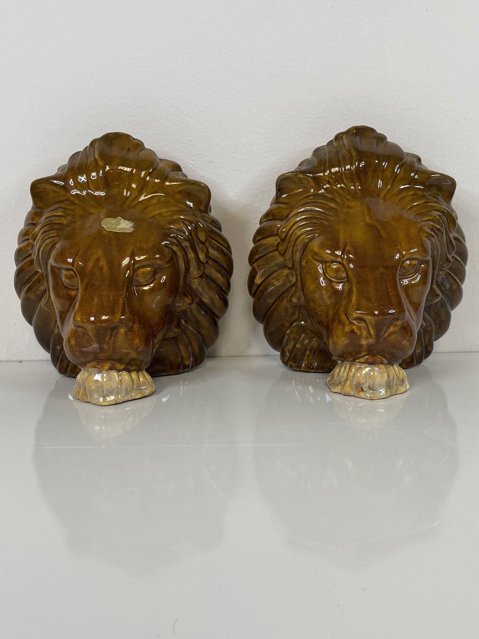 Royal Haeger Bookends: Neat bookends featuring Lions Heads, One with original sticker at 7 1/2" tall